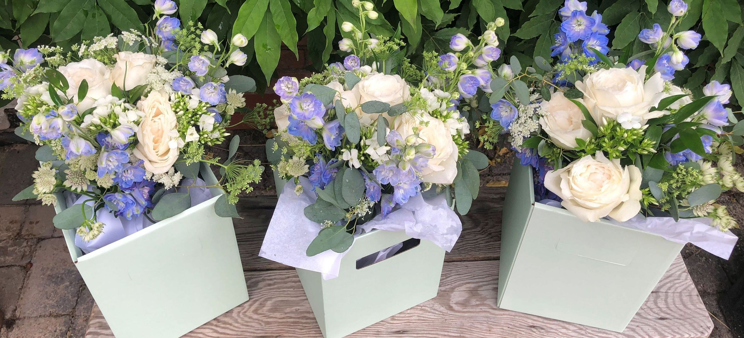 Outdoor wedding in warwickshire with flower display