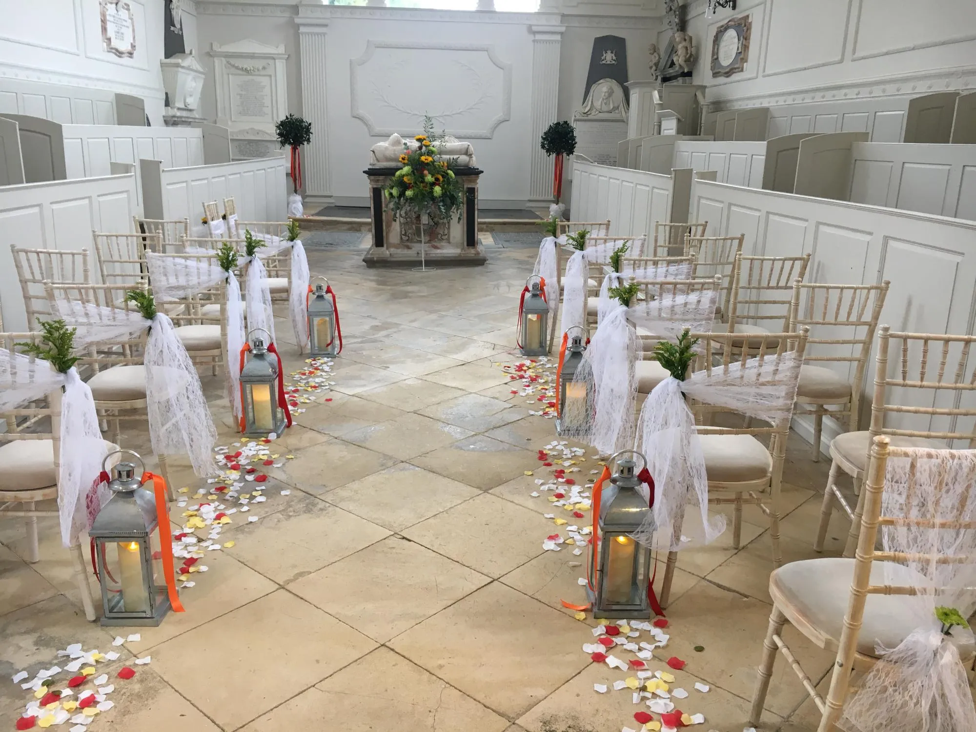 wedding ceremony lanterns petals flowers and sashes warwickshire