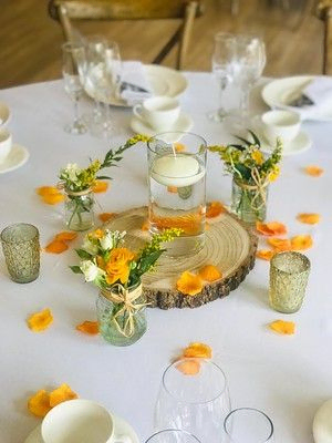 Yellow rustic flowers table piece in warwickshire